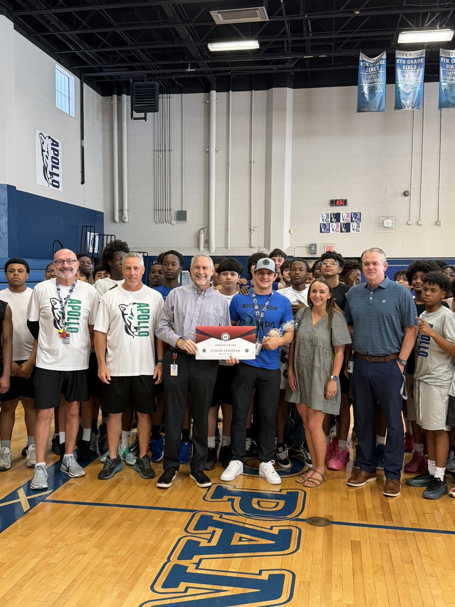 Coach Lenihan and kids after getting Coach of the year