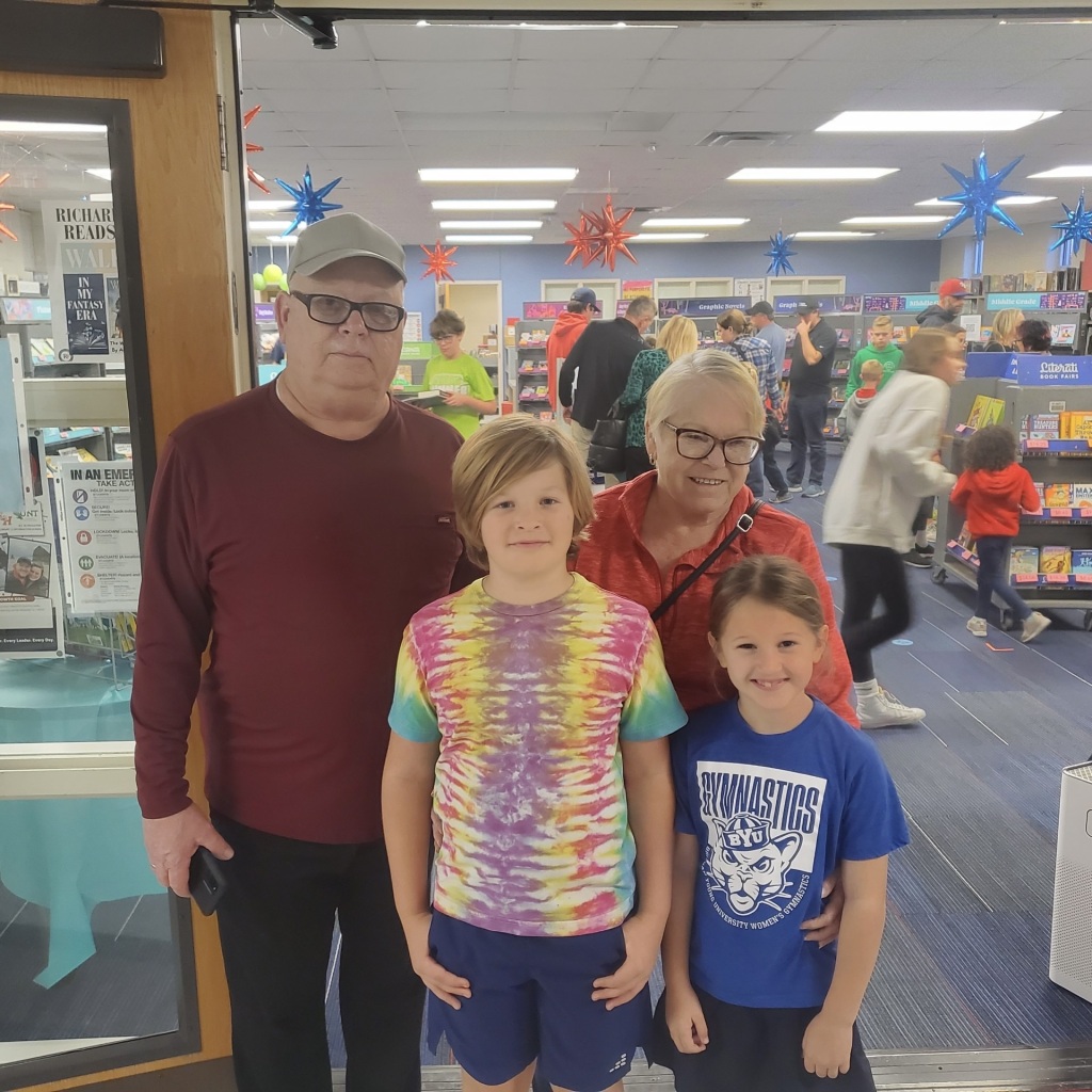 Students attended the Grand Opening of ACM's Fall Book Fair with grandparents and loved ones.