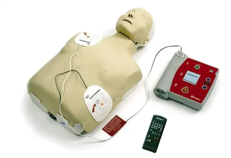 Dummy with AED machine