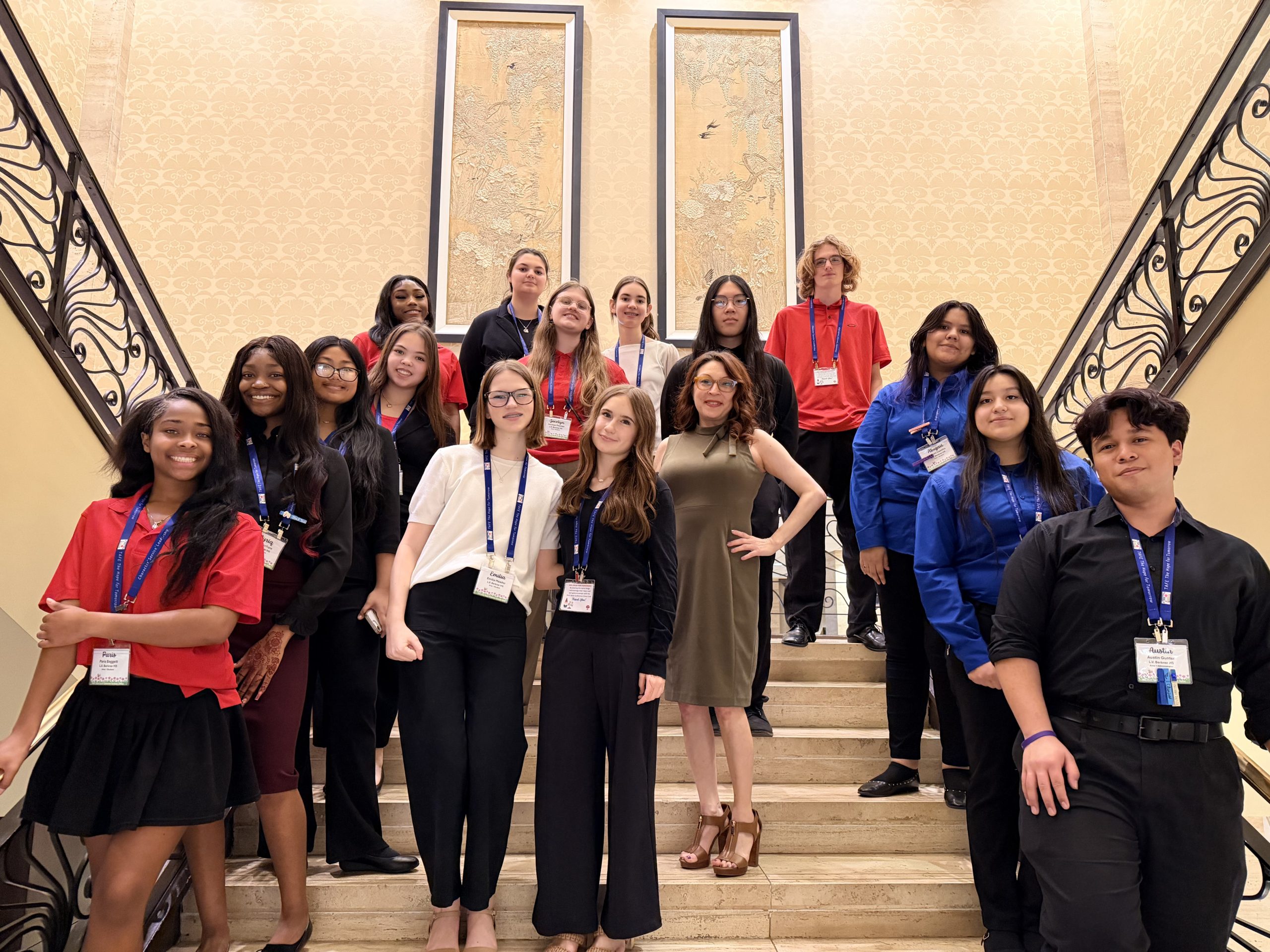 A group of Berkner High School TAFE students smiling and holding their awards and medals. They are celebrating their success at the Texas Association of Future Educators State competition, where 12 students placed and five qualified for Nationals.