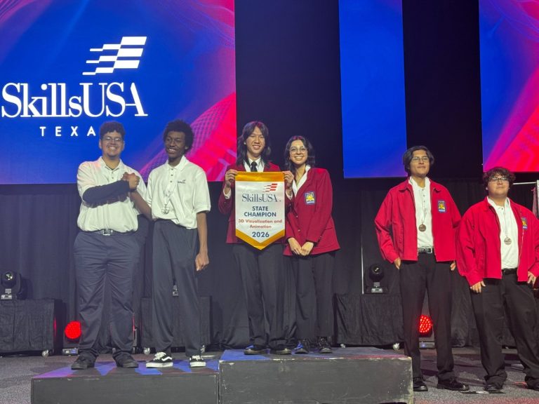 Berkner High School seniors Dat Nguyen and Lorena Araujo stand proudly on the first-place podium at the SkillsUSA Texas State competition. They are wearing official red SkillsUSA blazers and holding a yellow "State Champion" banner for 3D Visualization and Animation.