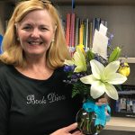 Mrs. Nowacki holding flowers