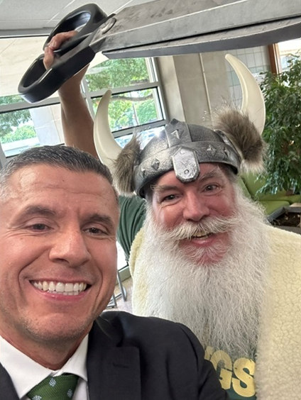 Picture of Mr. Lpez and Mr. Rosen at Camp North