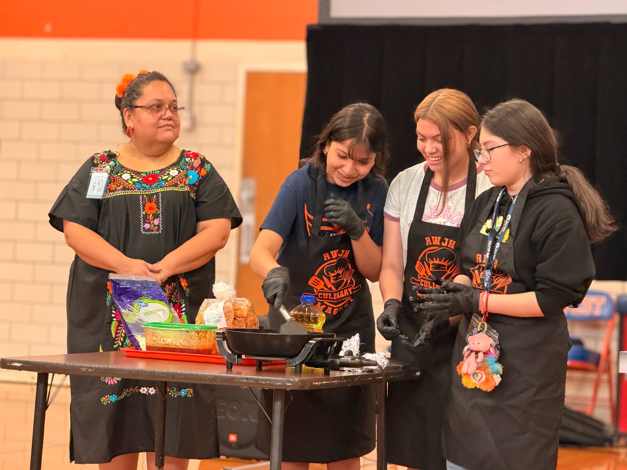 Students doing a cooking demonstration