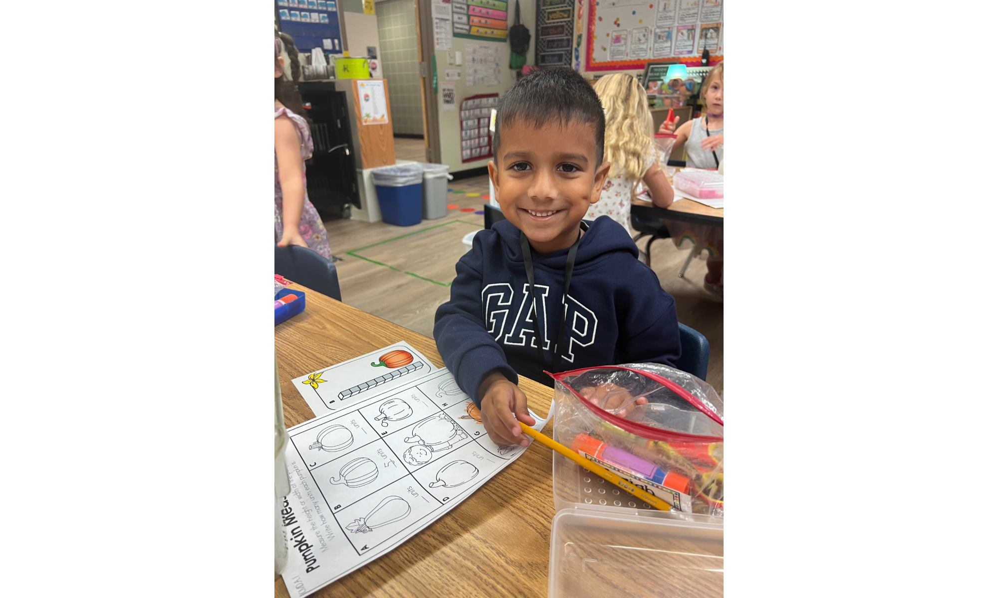 Measuring Pumpkins in Kindergarten Image