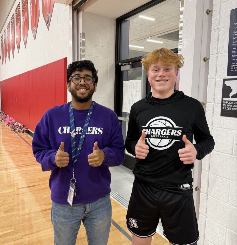 Teddy bear toss Garay and STUCO President thumbs up for Successful Teddy Bear toss