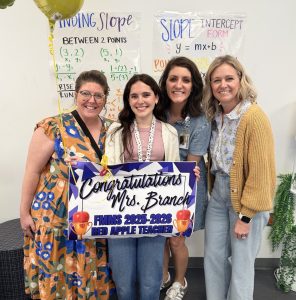 Congratulations
to
Mrs.
Branch!
We are proud to share that Mrs. Branch, Algebra I teacher, has been named the FMMS Red Apple First-Year Teacher of the Year!



In her very first year at Forest Meadow Middle School, Mrs. Branch has already made an incredible impact on our Charger community. Her dedication to her students, commitment to strong instruction, and positive presence in the classroom have helped create an engaging learning environment where students feel supported and challenged to grow.



Mrs. Branch’s passion for teaching and her willingness to jump in, learn, and lead have truly stood out this year. We are grateful for the energy and care she brings to FMMS each day.



Please join us in congratulating Mrs. Branch on this well-deserved recognition! 💜⚡🍎