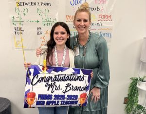 Congratulations
to
Mrs.
Branch!
We are proud to share that Mrs. Branch, Algebra I teacher, has been named the FMMS Red Apple First-Year Teacher of the Year!



In her very first year at Forest Meadow Middle School, Mrs. Branch has already made an incredible impact on our Charger community. Her dedication to her students, commitment to strong instruction, and positive presence in the classroom have helped create an engaging learning environment where students feel supported and challenged to grow.



Mrs. Branch’s passion for teaching and her willingness to jump in, learn, and lead have truly stood out this year. We are grateful for the energy and care she brings to FMMS each day.



Please join us in congratulating Mrs. Branch on this well-deserved recognition! 💜⚡🍎